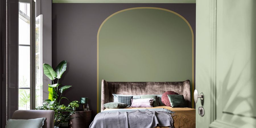 Schlafzimmer mit grüner Wandfarbe