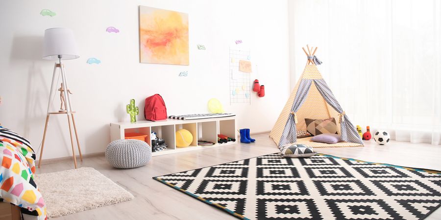 Kinderzimmer mit Teppich und einem Tipi