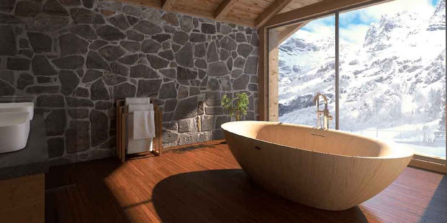 Holzbadewanne in einem Badezimmer mit Bergpanorama