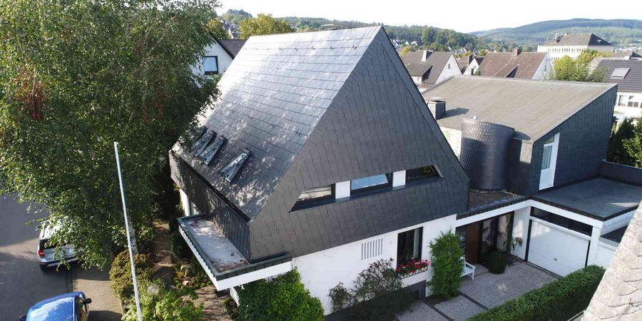 Eine einheitliche Dach- und Hausfassade für alle Gebaeude - Rathscheck Schiefer